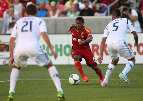 Kim Raff  |  The Salt Lake Tribune
(middle) Real Salt Lake forward Joao Plata (8) looks for an opening past (right) Los Angeles Galaxy defender Sean Franklin (5) and (left) Los Angeles Galaxy defender Tommy Meyer (21) during the first half of a game at Rio Tinto Stadium in Salt Lake City on June 8, 2013.