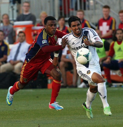 Kim Raff  |  The Salt Lake Tribune
(left) Real Salt Lake forward Robbie Findley (10) and (right) Los Angeles Galaxy defender A.J. DeLaGarza (20) compete for a ball during the first half of a game at Rio Tinto Stadium in Salt Lake City on June 8, 2013.