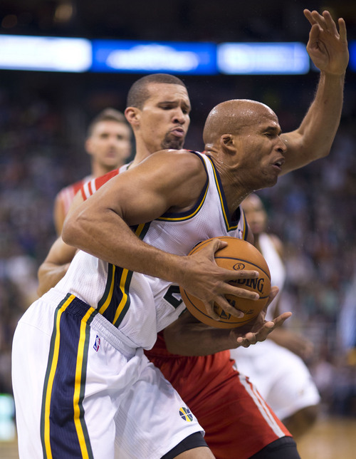 Lennie Mahler  |  The Salt Lake Tribune
Jazz forward Richard Jefferson draws a foul from Rockets guard Francisco Garcia in the first half of a game against the Houston Rockets on Saturday, Nov. 2, 2013, at EnergySolutions Arena in Salt Lake City.