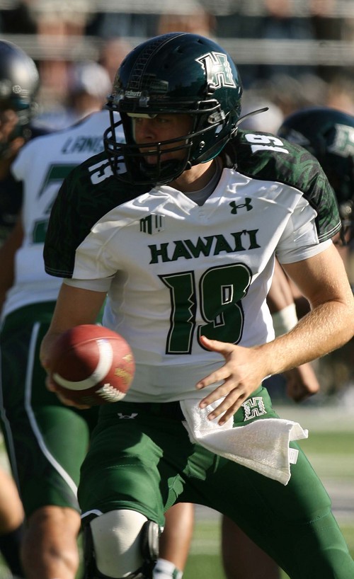 Leah Hogsten  |  The Salt Lake Tribune
Hawaii Warriors quarterback Sean Schroeder (19). Utah State University hosts Hawaii at Romney Stadium, Saturday, November 2, 2013.