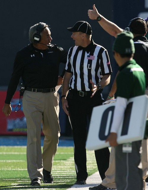 Leah Hogsten  |  The Salt Lake Tribune
Hawaii Warriors head coach Norm Chow jaws with the referee over the interception by Utah State. Utah State University hosts Hawaii at Romney Stadium, Saturday, November 2, 2013.