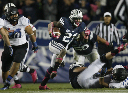 Scott Sommerdorf   |  The Salt Lake Tribune
Brigham Young Cougars running back Jamaal Williams (21) gains yardage during fourth quarter play. BYU defeated Boise State 37-20, Friday, October 25, 2013.