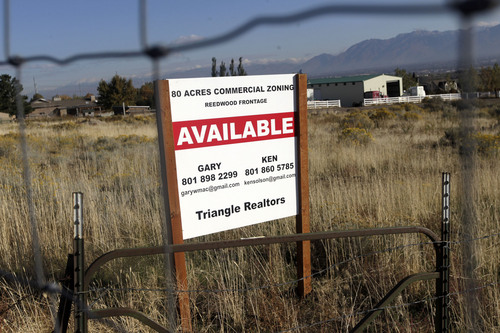 Al Hartmann  |   The Salt Lake Tribune
A sign, on Oct. 15, 2013, advertises an 80-acre parcel along Redwood Road north of the NSA Utah Data Center that Bluffdale would like to see developed into a commercial business center for the growing area.