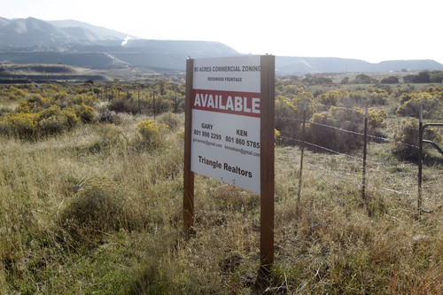 Al Hartmann  |  The Salt Lake Tribune
A sign, on Oct. 15, 2013, advertises an 80-acre parcel along Redwood Road north of the NSA Utah Data Center that Bluffdale would like to see developed into a commercial business center for the growing area.