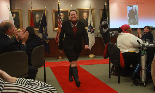 Rick Egan  | The Salt Lake Tribune 

Kim Adamson poses on the run way during the Women Veterans Fatigues to Fabulous fashion show, Monday, November 4, 2013.