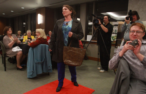 Rick Egan  | The Salt Lake Tribune 

Darlene Bledsoe walks the run way during the Women Veterans Fatigues to Fabulous fashion show, Monday, November 4, 2013.