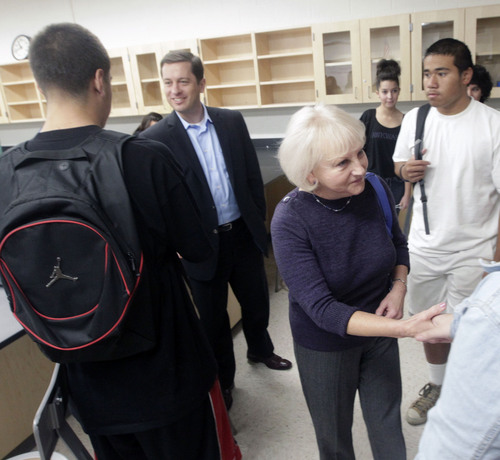 Al Hartmann  |  The Salt Lake Tribune
Senator Aaron Osmond, left,  and Senator Karen Mayne meet students in a chemistry class during a tour of Granger High School in West Valley City Monday November 4.  Mayne was a graduate from the school.  They were among several Utah legislators and Granite School District officials to observe the learning environment in the school, to identify areas for improvement and to work on solutions. Utah's new School Grading evaluation gave Granger High Schools a D.