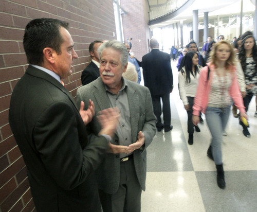 Al Hartmann  |  The Salt Lake Tribune
Representative Greg Hughes left,  talks with Senator Gene Davis during a tour of Granger High School in West Valley City Monday November 4.  They were among several Utah legislators and Granite School District officials to observe the learning environment in the school, to identify areas for improvement and to work on solutions. Utah's new School Grading evaluation gave Granger High Schools a D.