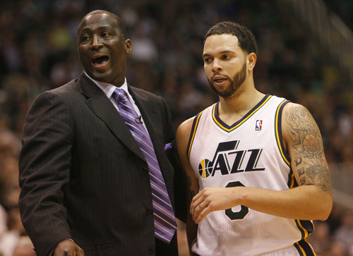 Photo by Chris Detrick | The Salt Lake Tribune 
Utah Jazz head coach Tyrone Corbin and Utah Jazz point guard Deron Williams (8) during the game against Phoenix at the EnergySolutions Arena Friday February 11, 2011.