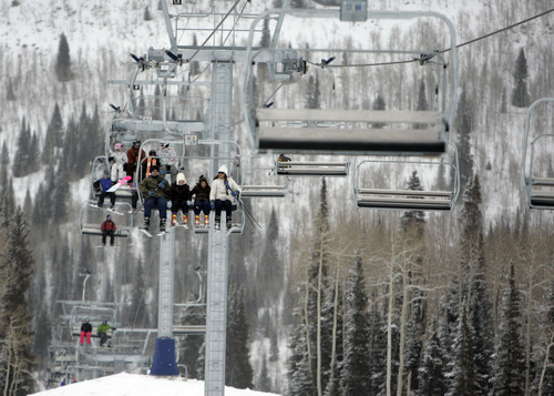 Jim Urquhart  |  The Salt Lake Tribune
Skiers make their way to the top of the Moonbeam chairlift during a day of skiing in 2010 at Solitude Mountain Resort in Big Cottownwood Canyon.  Utahís ski resort season will open Friday when Solitude cranks up three lifts, kicking the 2013-14 season off a little earlier than planned.