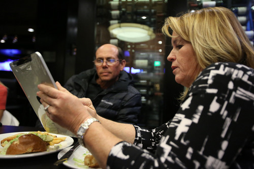 Francisco Kjolseth  |  The Salt Lake Tribune
Councilwoman Karen Lang, alongside her husband Brian sees she is trailing by over 800 votes for West Valley City mayor as she is joined by friends and family at Shula's Grill 347 in the Embassy Suites hotel where she was keeping track of the numbers on Tuesday, Nov. 5, 2013.