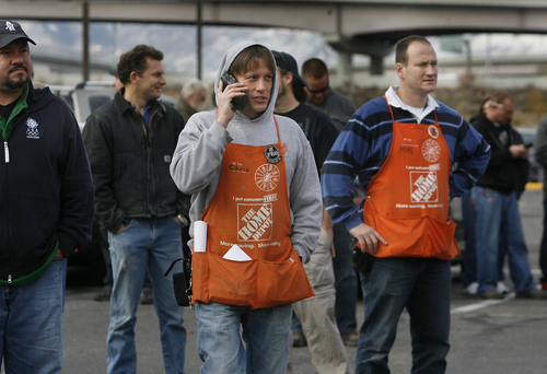 Scott Sommerdorf   |  The Salt Lake Tribune
Home Depot employees were evacuated from the Home Depot at 2100 South and 300 West as police searched the business with dogs and officers for a suspect in multiple car thefts that originated in West Valley City, Wednesday, Nov. 6, 2013.