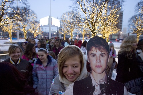 Kim Raff  |  The Salt Lake Tribune
Madison Jorgensen holds a cardboard cutout of Justin Bieber while waiting in line to enter a sold-out Justin Bieber concert at EnergySolutions Arena in Salt Lake City on January 5, 2013.