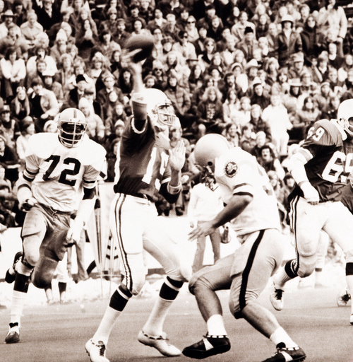 Utah quarterback  Don Van Galder passes amid a fierce Arizona State pass rush during the Utes' shocking 36-31 victory over the No. 8 Sun Devils at Rice Stadium. Salt Lake Tribune archive.