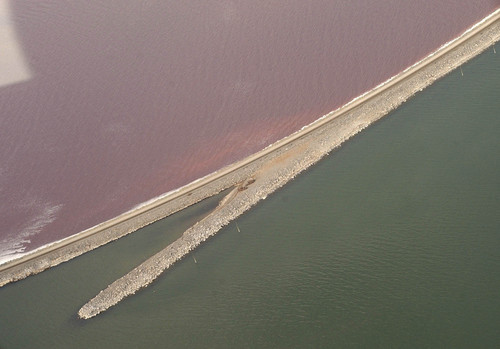 The Union Pacific causeway across the Great Salt Lake separates the super-saline North Arm (top) from the rest of the lake. The last culvert that allows the water to mix could collapse any day, prompting the railroad to seek emergency permission to fill it.    Francisco Kjolseth/The Salt Lake Tribune      08/27/2002