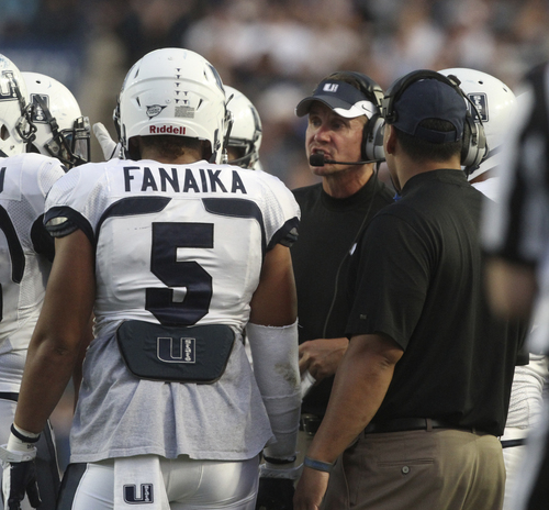 Rick Egan  | The Salt Lake Tribune 

Utah State Aggies head coach Gary Andersen gives instructions to his team,  during a break in the action, at Lavell Edwards Stadium in Provo, Friday, September 30, 2011.