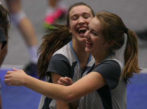 Leah Hogsten  |  The Salt Lake Tribune
Salem Hills celebrates a point. Woods Cross High School girls played Salem Hills High School during their girls 4A state volleyball quarterfinals Thursday, November 7, 2013 at Utah Valley University's UCCU Center.