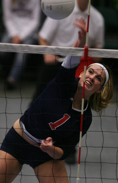 Leah Hogsten  |  The Salt Lake Tribune
Woods Cross' Lexi Lewis makes a kill. Woods Cross High School girls played Salem Hills High School during their girls 4A state volleyball quarterfinals Thursday, November 7, 2013 at Utah Valley University's UCCU Center.