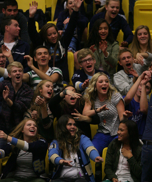 Leah Hogsten  |  The Salt Lake Tribune
Salem Hills fans ride the coaster. Woods Cross High School girls played Salem Hills High School during their girls 4A state volleyball quarterfinals Thursday, November 7, 2013 at Utah Valley University's UCCU Center.