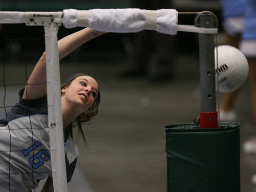 Leah Hogsten  |  The Salt Lake Tribune
Salem Hills' Cassidy Adams blocks at the net. Woods Cross High School girls played Salem Hills High School during their girls 4A state volleyball quarterfinals Thursday, November 7, 2013 at Utah Valley University's UCCU Center.