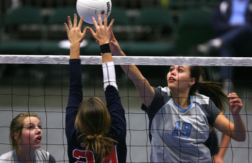 Leah Hogsten  |  The Salt Lake Tribune
Salem Hills' Emilee Davis blocks at the netWoods Cross High School girls played Salem Hills High School during their girls 4A state volleyball quarterfinals Thursday, November 7, 2013 at Utah Valley University's UCCU Center.