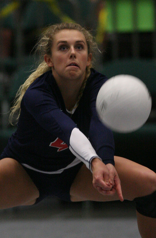 Leah Hogsten  |  The Salt Lake Tribune
Woods Cross' Lindsey Tagge makes a dig. Woods Cross High School girls played Salem Hills High School during their girls 4A state volleyball quarterfinals Thursday, November 7, 2013 at Utah Valley University's UCCU Center.