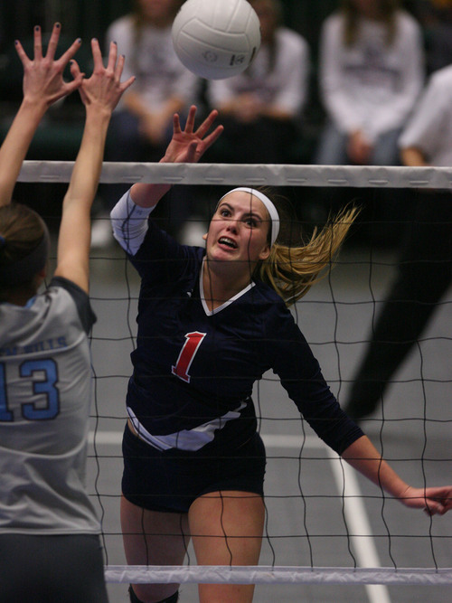 Leah Hogsten  |  The Salt Lake Tribune
Woods Cross' Lexi Lewis pushes the ball over the net. Woods Cross High School girls played Salem Hills High School during their girls 4A state volleyball quarterfinals Thursday, November 7, 2013 at Utah Valley University's UCCU Center.