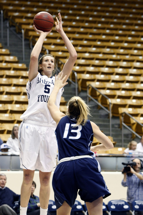 Chris Detrick  |  The Salt Lake Tribune
Brigham Young Cougars center Jennifer Hamson (5) shoots over San Diego Toreros forward Felicia Wijenberg (13) during the second half of the game at the Marriott Center Thursday February 7, 2013. BYU won the game 53-48.