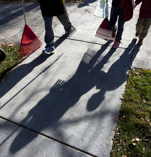 Steve Griffin  |  The Salt Lake Tribune


McGillis School students from kindergarten through eighth grade work together to rake leaves and clean-up yards for those who may need the extra help during the school's annual  "Fall Leaf Haul"  in the Douglas Neighborhood surrounding the school in Salt Lake City, Utah Friday, November 8, 2013.