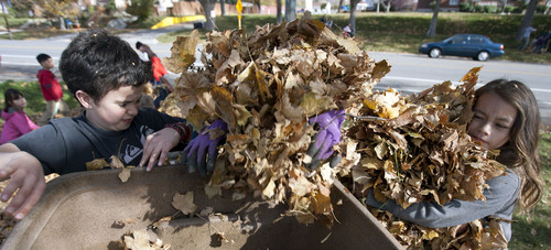 Steve Griffin  |  The Salt Lake Tribune


McGillis School students from kindergarten through eighth grade work together to rake leaves and clean-up yards for those who may need the extra help during the school's annual  ìFall Leaf Haulî  in the Douglas Neighborhood surrounding the school in Salt Lake City, Utah Friday, November 8, 2013.