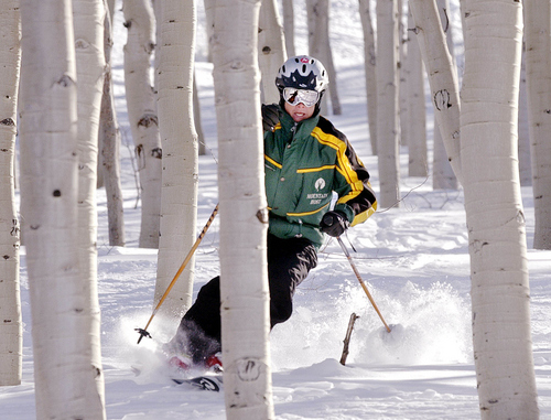Steve Griffin | The Salt Lake Tribune

Deer Valley Mountain Host supervisor, Tate Shaw, skis through the trees at the resort  Jan. 12, 2004.