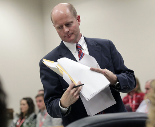 Al Hartmann  |  The Salt Lake Tribune
Utah County Prosecuter Chad Grunader  gives closing arguments before jury on the final day of the murder trial for Pleasant Grove physician Martin MacNeill in Provo, Utah 4th District Court Friday November 8, 2013. .  MacNeill is  charged with murder for allegedly killing his killing his wife, Michele MacNeill, in 2007 so he could continue an extra-marital affair.