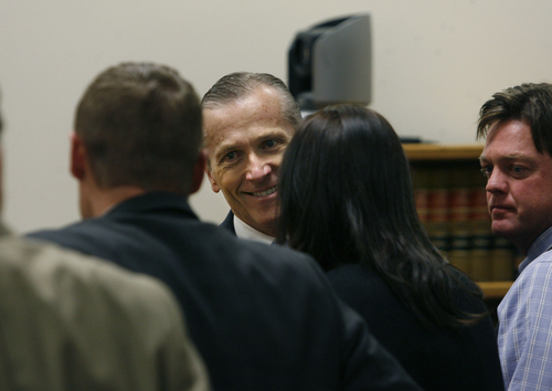 Scott Sommerdorf   |  The Salt Lake Tribune
Martin McNeill greets his defense team as he enters the courtroom after the jury reached a verdict. McNeill was found guilty of murder and obstruction of justice early Saturday morning, November 9, 2013.