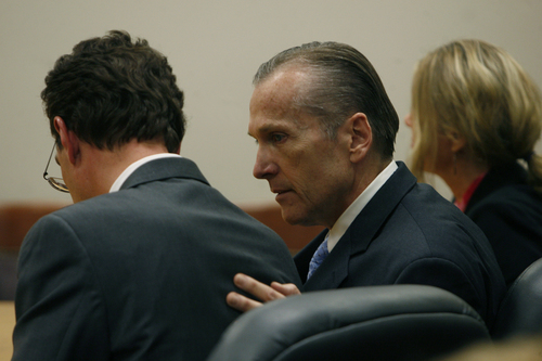 Scott Sommerdorf   |  The Salt Lake Tribune
Martin MacNeill speaks with his attorney Randy Spencer, left, after he was found guilty of murder and obstruction of justice early Saturday morning, November 9, 2013.