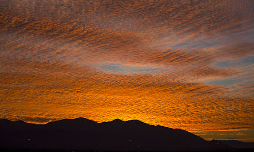Lennie Mahler  |  The Salt Lake Tribune
The sun sets over the Oquirrh Mountains seen from Salt Lake City on Saturday, Nov. 9, 2013.