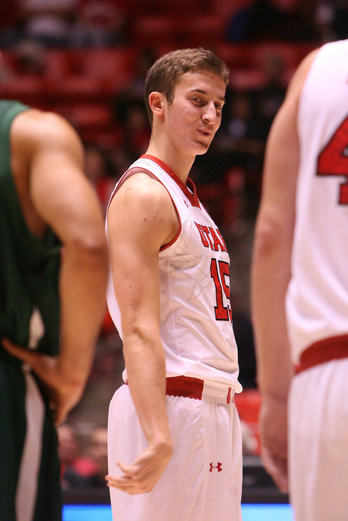 Leah Hogsten  |  The Salt Lake Tribune
The Utes guard Austin Eastman reacts to a missed free throw, but he sinks the second.  University of Utah defeated Evergreen State 128-44 Friday, November 8, 2013 at the Huntsman Center.