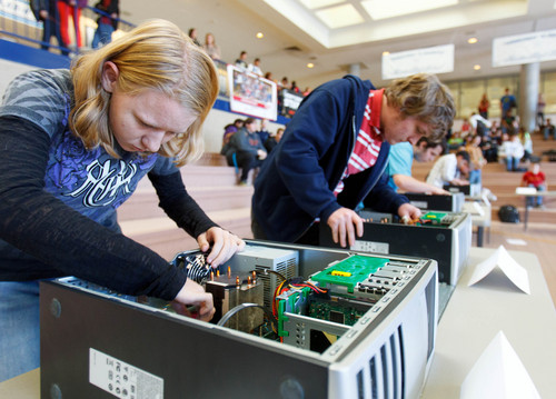 Trent Nelson  |  The Salt Lake Tribune
Students compete in the sixth annual Fastest Geek Contest at Hunter High School  in the Granite School District on Friday. Kerri Raye DeHaven is at  left, and Kevin Briggs is at right. Granite, the largest district in the Salt Lake Valley, has seen its growth slow enough -- less than 1 percent this year -- that it turned 14 elementaries back to traditional rather than year-round schedules, said spokesman Ben Horsley.