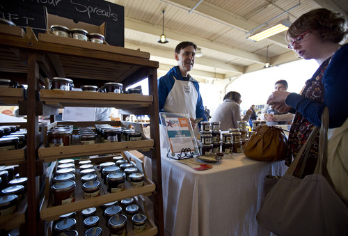 Lennie Mahler  |  The Salt Lake Tribune
Melissa Willes looks at the Amour Spreads table run by John Francis at the Winter Farmers Market on Saturday, Nov. 9, 2013. The market runs from 10 a.m. to 2 p.m. every other Saturday at the Rio Grande Depot in downtown Salt Lake City.
