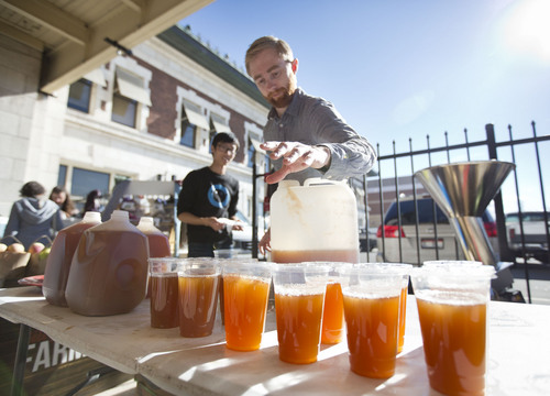 Lennie Mahler  |  The Salt Lake Tribune
James Rasmussen serves up fresh pressed apple cider at the Winter Farmers Market on Saturday. The market runs from 10 a.m. to 2 p.m. every other Saturday at the Rio Grande Depot in downtown Salt Lake City.