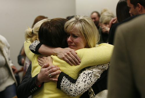 Scott Sommerdorf   |  The Salt Lake Tribune
Linda Cluff, sister of Michele MacNeill hugs friends after court was adjourned following the guilty verdict against Martin MacNeill.MacNeill was found guilty of murder and obstruction of justice early Saturday morning, November 9, 2013.