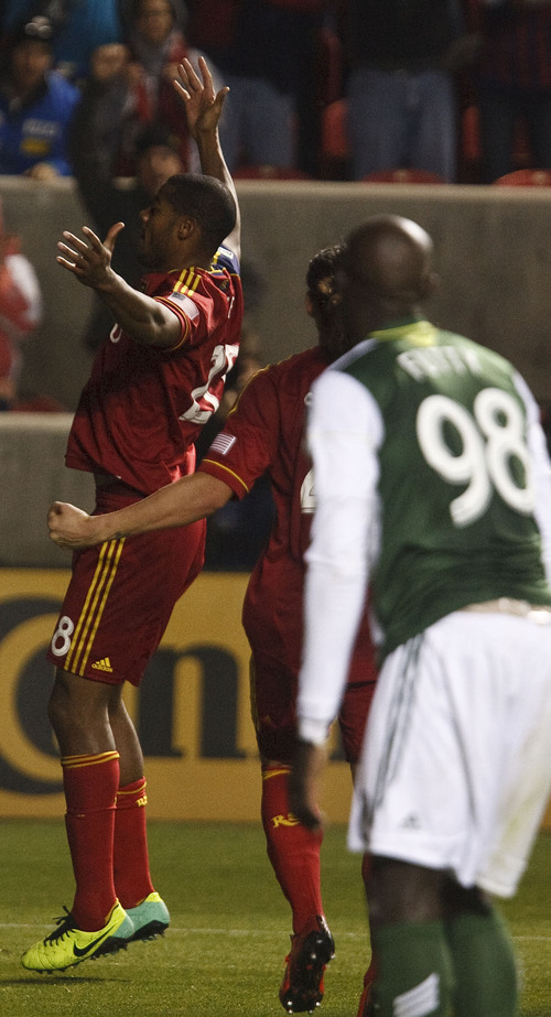 Leah Hogsten  |  The Salt Lake Tribune
Real Salt Lake defender Chris Schuler (28) celebrates his first half goal.  Real Salt Lake leads the Portland Timbers 1-0 at the half during their first leg of  the Western Conference final series Sunday, November 10, 2013 at Rio Tinto Stadium.