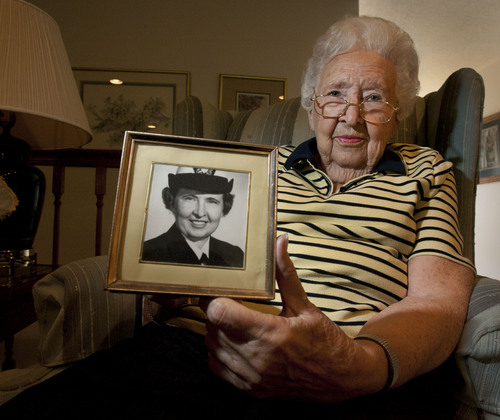 Steve Griffin  |  The Salt Lake Tribune
Maxine Conder holds a picture of herself taken in the late 1950s in her Layton home Friday, Nov. 8, 2013. Conder was the second female admiral in U.S. naval history. She served as a nurse in Korea and in administrative roles during Vietnam. Conder and several other veterans will be honored on Veterans Day at the University of Utah.