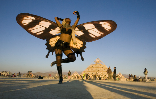 Rick Egan  | The Salt Lake Tribune 

Claudine Arthurs, New York City, dances with butterfly wings, during the Burning Man Festival, in the Black Rock Desert, Nev., Friday, August 30, 2013.