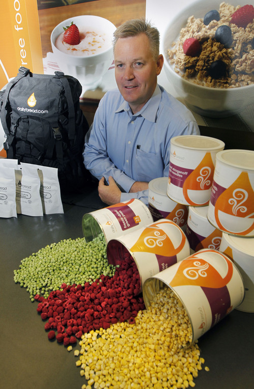 Al Hartmann  |  The Salt Lake Tribune
Mark Hyland, CEO of Daily Bread, with freeze-dried peas, raspberries and corn at their administrative office in Kaysville. The company makes dozens of foods from vegetables and fruits to meat and prepared dinners for emergency food supplies that can last for 25 years.