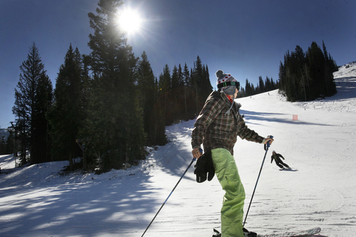 Scott Sommerdorf   |  The Salt Lake Tribune
Skiers and snowboarders enjoy a sunny Sunday on Solitude's Little Dollie run, Sunday, November 10, 2013.