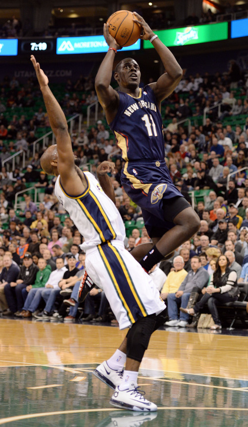 Steve Griffin  |  The Salt Lake Tribune


New Orleans Pelicans point guard Jrue Holiday #11 gets passed Utah Jazz point guard John Lucas III #5 as he connects on a basket during first half action in the Jazz versus New Orleans Pelicans basketball game at EnergySolutions Arena in Salt Lake City, Utah Thursday, November 14, 2013.