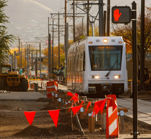 Trent Nelson  |  Tribune file photo
A test train runs on the Sugar House streetcar line as the Utah Transit Authority prepares for the scheduled Dec. 8 opening of the new system. UTA will offer a $1 reduced fare for those using electronic media to pay fare during a limited time period.