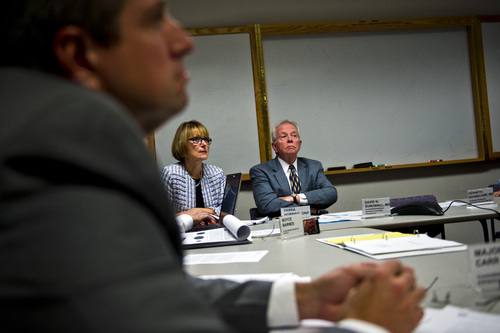Chris Detrick  |  The Salt Lake Tribune
Utah Controlled Substance Advisory Committee members Debra Hobbins, DNP, David N. Sundwall, M.D., and Major Jeff Carr listen as Josh Stanley, Founder of Realm of Caring in Colorado Springs, speaks during a hearing at the Heber M. Wells Building in Salt Lake City Tuesday November 12, 2013.