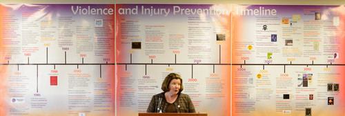 Trent Nelson  |  The Salt Lake Tribune
Trisha Keller, Program Manager of the Utah Department of Health Violence and Injury Prevention Program (VIPP) speaks before a fifteen foot long timeline of progress as state officials and others celebrated 30 years of violence and injury prevention in Utah on Thursday.