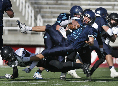 Scott Sommerdorf   |  The Salt Lake Tribune
Juan Diego QB Stephen Nelson runs during Juan Diego's second early TD drive. The Soaring Eagle took a very early 14-0 lead over Pine View, Thursday, November 14, 2013 at Rice-Eccles Stadium during the 3AA semi-final playoff.